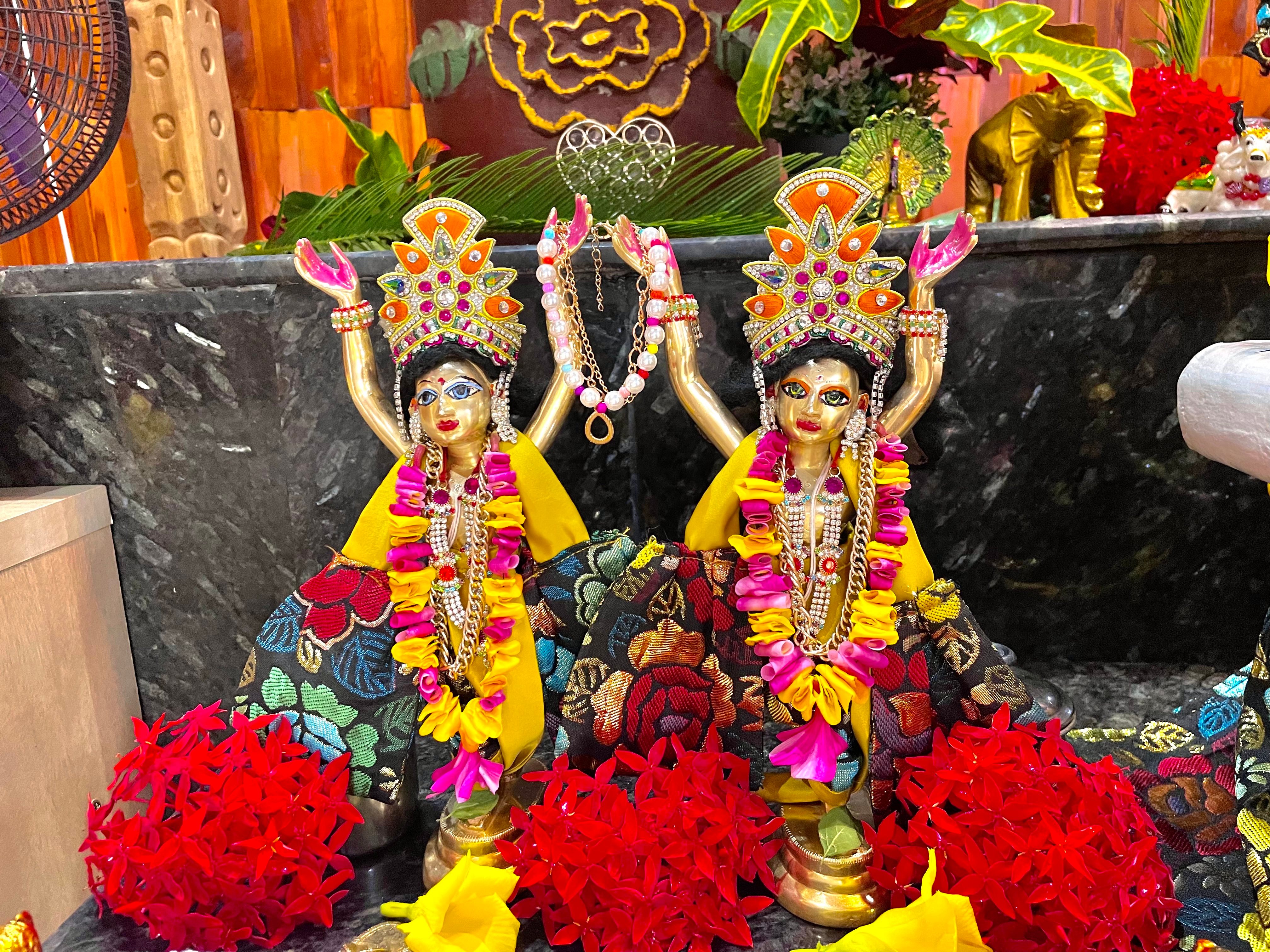 Deities of Sri Sri Gaura Nitai with raised arms at ISKCON Kumasi