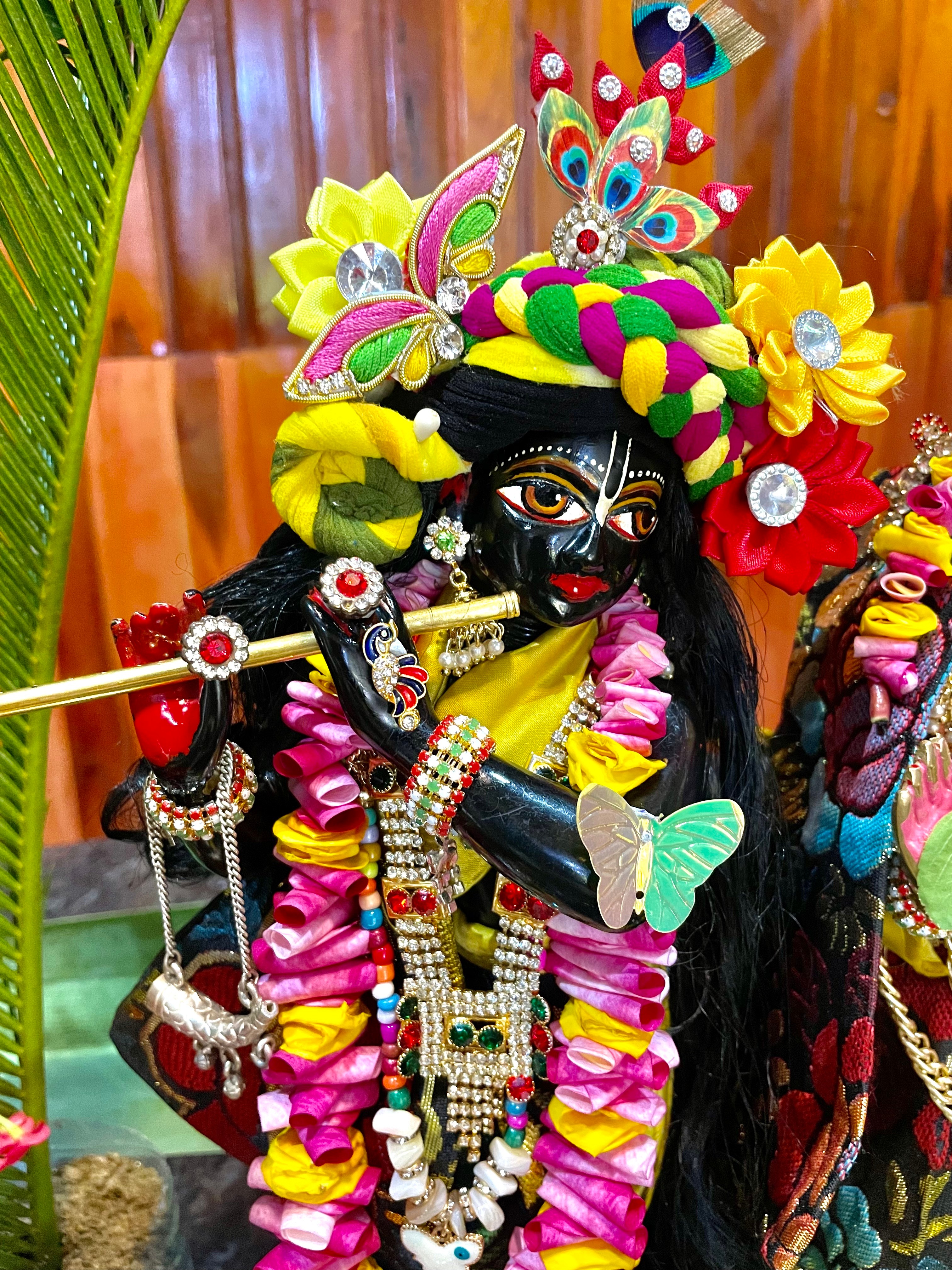 Beautifully adorned deity of Lord Gopinatha (Krishna) playing the flute at ISKCON Kumasi